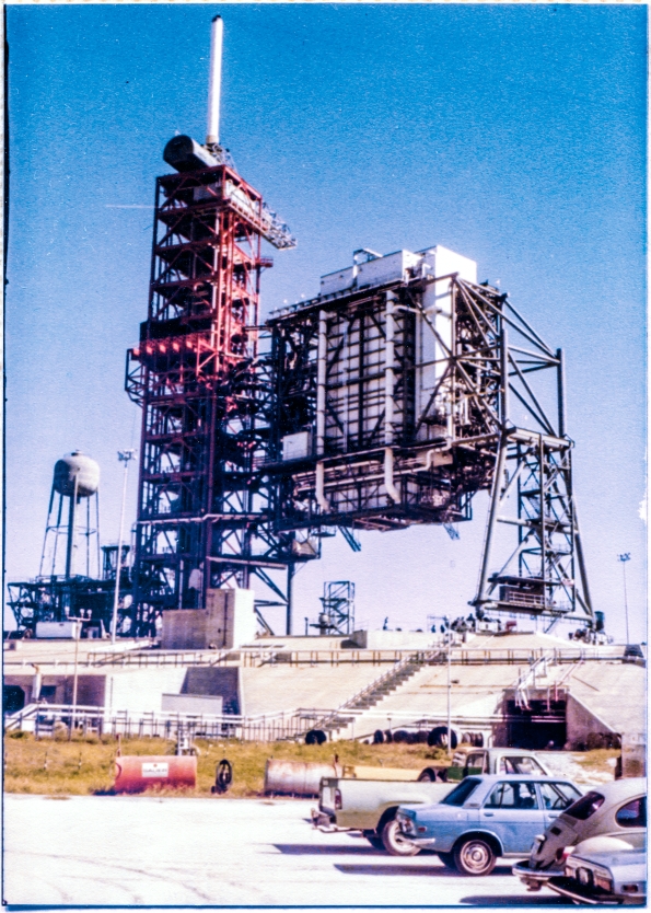 Image 052. The Rotating Service Structure at Space Shuttle Launch Complex 39-B, Kennedy Space Center, Florida, constructed by Union Ironworkers from Local 808 working for Wilhoit Steel Erectors, shows no outward sign that it has just completed one-third of a full pirouette, pivoting its colossal mass of four million pounds back around to the position which had occupied during the years of its initial construction phase, completing its first proof-test rotational demonstration that it was in fact designed well, and built well. Photograph by James MacLaren.